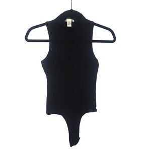 Bozzolo one piece black top with deep cut arm holes in back